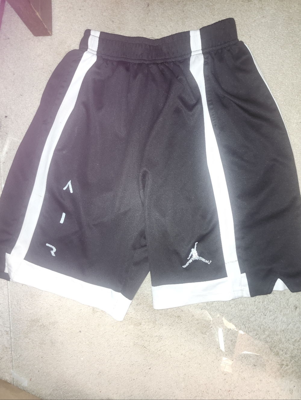 Black and White AIR Basketball shorts.